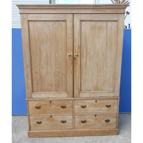 1296 - Pine Housekeepers type cupboard, moulded cornice above two panel doors and four short drawers, on sk... 