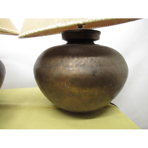 1306 - Pair of Indian style table lamps, globular hammered metal bodies with parchment type shades, H60cm (... 