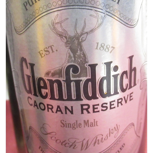 1192 - Glenfiddich Single Malt scotch Whisky, Caoran Reserve in tin tube, and Glenfiddich Special Reserve S... 