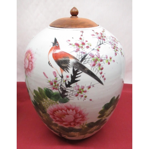 1140 - Pair of Chinese ovoid jars, bodies decorated with birds amongst prunus blossom and tree peonies and ... 