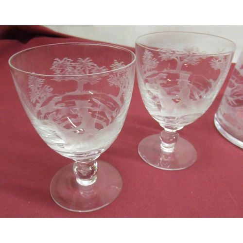 1123 - Glass water set, the jug and four goblets each decorated with a hunting scene and signed W G Webb, H... 