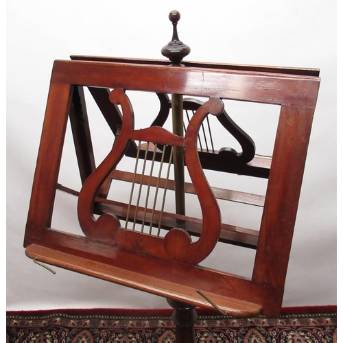 1314 - C19th mahogany duet stand, the twin rests on ratchet supports with fretted lyres on a stop fluted co... 