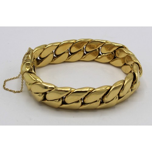 1004 - Kutchinski 18ct gold curb chain bracelet with tongue and groove fastener, twin catches and safety ch... 