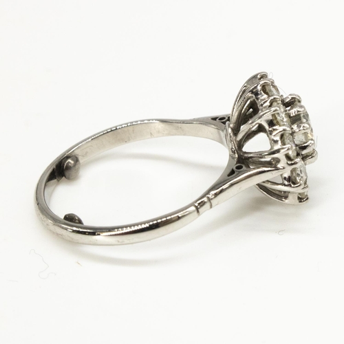 1000 - Diamond daisy ring, round cut claw set central diamond surrounded by ten smaller claw set round cut ... 