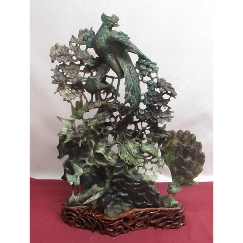 1102 - Large Chinese carved jadeite tableau of exotic 
birds, pheasants and cranes within profuse foliage, ... 