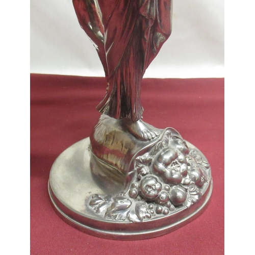 1052 - Art Nouveau WMF silver plated table centre, modelled as a maiden supporting a flower, on a circular ... 