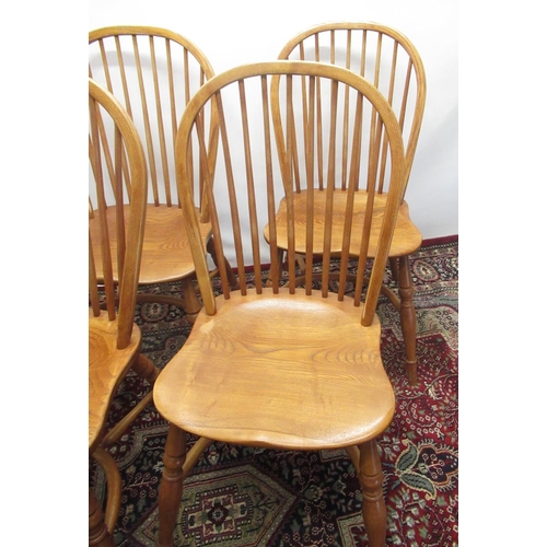 1279 - Set of four Treske Furniture elm Windsor type chairs, hoop and stick backs and shaped seats on turne... 