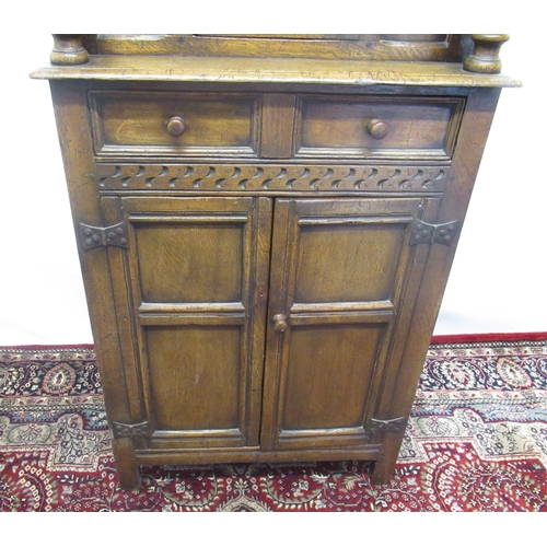 1344 - Small Titchmarsh & Goodwin carved oak court cupboard or Buffet, with arched door and long drawer abo... 