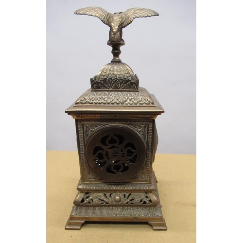 1265 - C20th brass cased mantel clock, square case with eagle finial, circular Roman dial on  pierced scrol... 