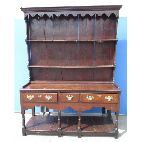 1318 - Geo. III open oak dresser, two tier planked back with moulded cornice and iron coat hooks, base with... 