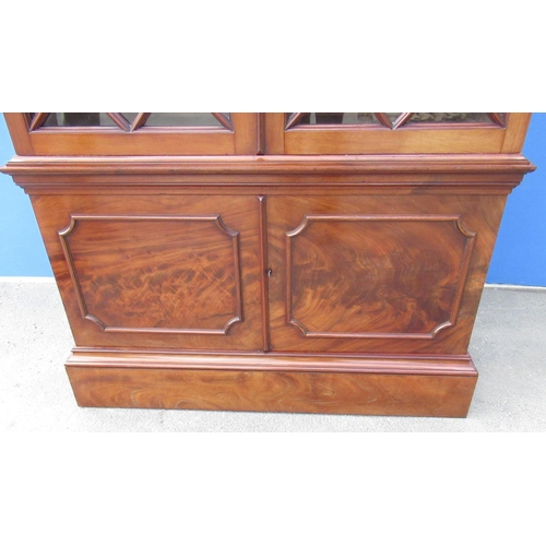 1316 - Large Victorian mahogany bookcase, moulded cornice with fluted frieze, two astragal  glazed doors en... 