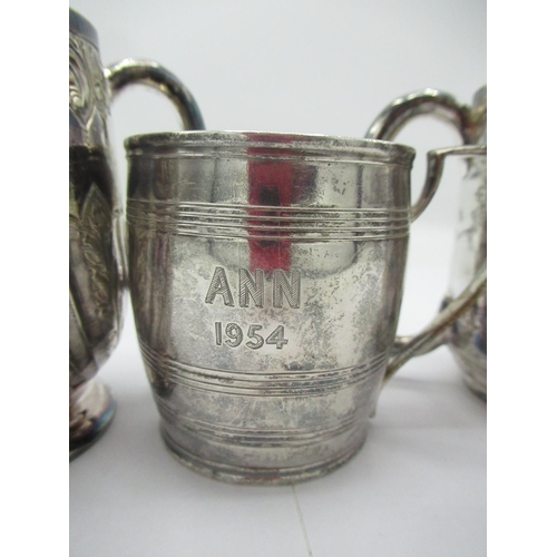 1068 - Three Victorian hallmarked silver Christening mugs, one with bright cut with loop handle and gilt in... 