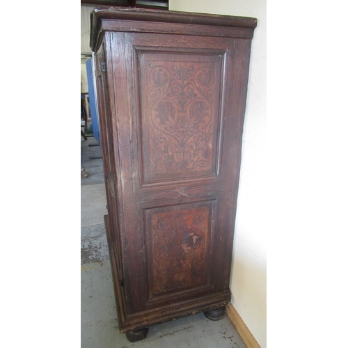 1320 - Early C19th Dutch ebonised strung oak side cabinet, the moulded top above two doors with four figura... 