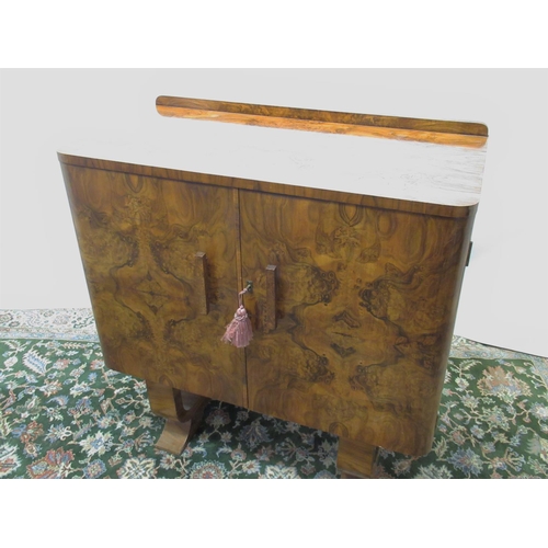 1048 - Art Deco figured and burr walnut side cabinet, twin doors revealing five drawers, part fitted with a... 