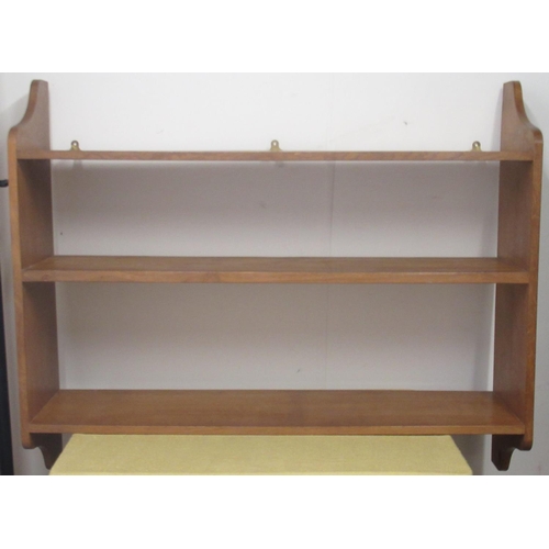 1281 - Alan Grainger Acorn Industries of Brandsby - book shelf with three rectangular tiers on shaped suppo... 