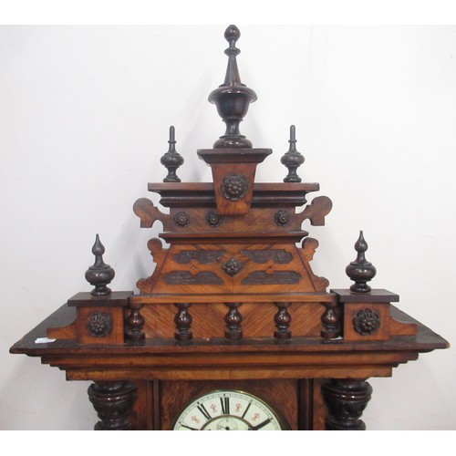 1264 - Victorian walnut cased Vienna type wall clock, pediment with urn finials, circular Roman dial with s... 