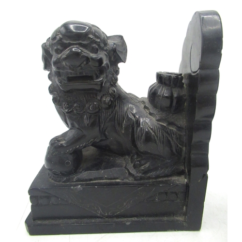 1106 - Pair of Chinese black marble bookends, carved as Dogs of Fo, on plinth bases, L14cm H17cm (A/F)