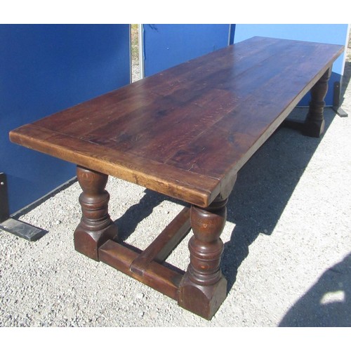 1319 - Large C17th style oak refectory table, cleated rectangular planked top on bold baluster and block su... 