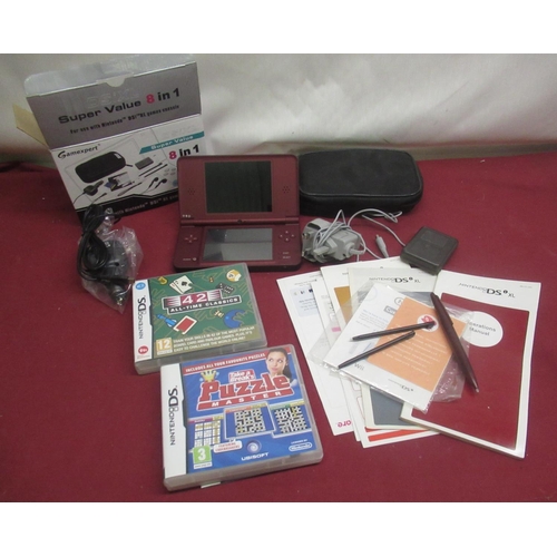 281 - Nintendo DS XL with instructions and black carry case, with Takes a Breaks puzzle master and 42 all-... 