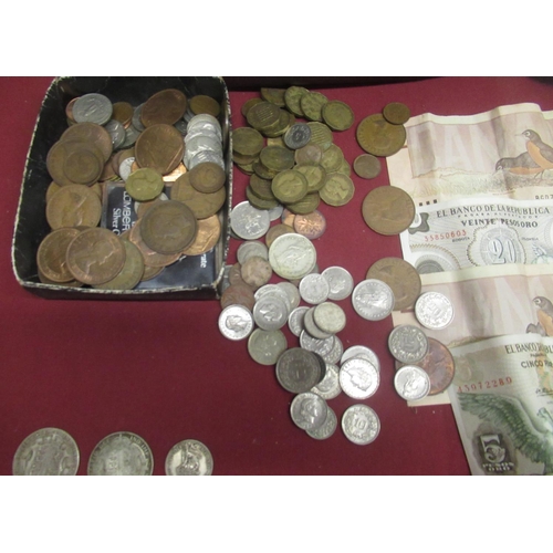 284 - Collection of mixed British and international coins and notes in a maroon case inc. a 1910 half-crow... 