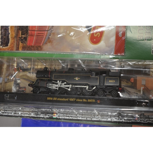 781a - Collection of magazine syndicated static train models and tin poster, 1954 Standard 4MT class No8007... 