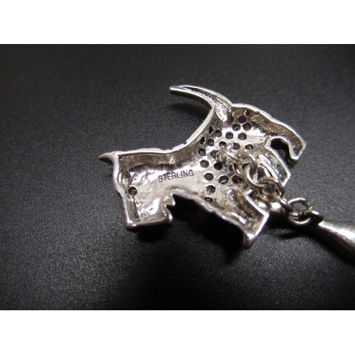 41 - Pair of hallmarked sterling silver cufflinks in the form of Scottie dogs, set with rubies, stamped S... 
