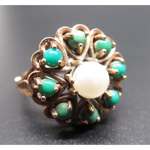 39 - 9ct yellow gold ring with set with a single pearl surrounded by eight green coloured round stones, s... 