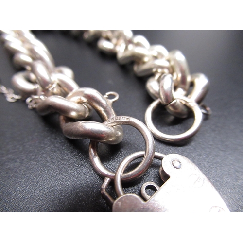 37 - Sterling silver charm bracelet, with safety chain, hallmarked London 1974, RB Ltd, L20cm weight, 1.7... 