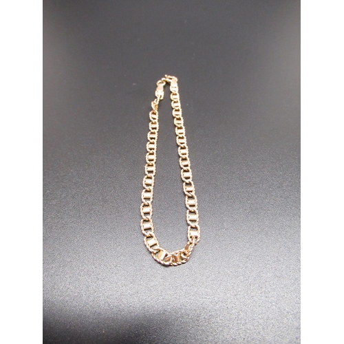 34 - 9ct yellow gold chain bracelet, stamped 375, and a 9ct yellow gold ring with twist detail, size P, g... 