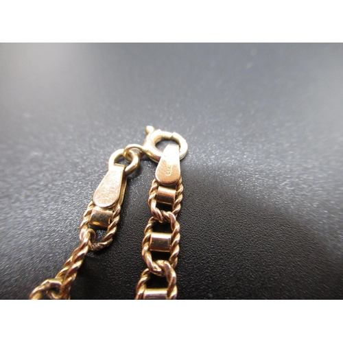 34 - 9ct yellow gold chain bracelet, stamped 375, and a 9ct yellow gold ring with twist detail, size P, g... 
