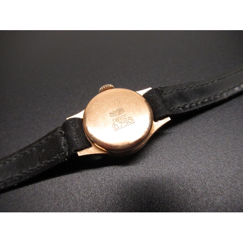 70 - Ladies Pierre Bassin 18ct gold hand wound wrist watch, signed silvered dial with applied gold colour... 