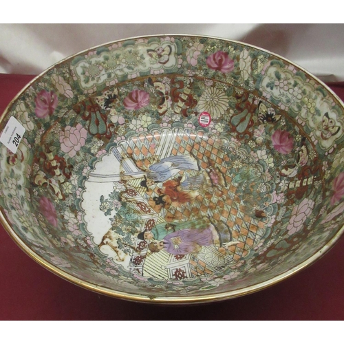 204 - C20th Export ware Famille rose bowl, central panel decorated with mandarin household scene, surround... 