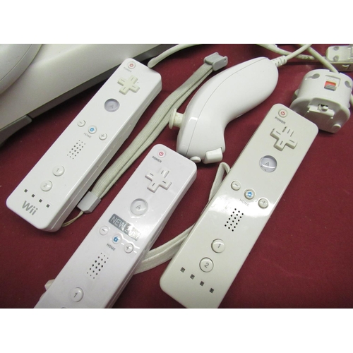 211 - Nintendo Wii with Wi fit board. TV sensor, controllers etc