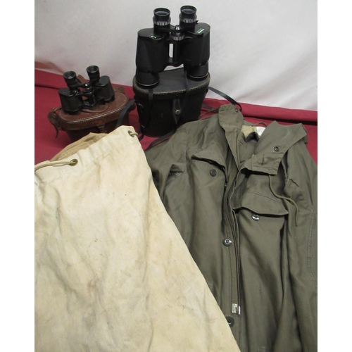 162 - German military type parka, label dated 1984, canvas kit bag, two military type cased binoculars (4)