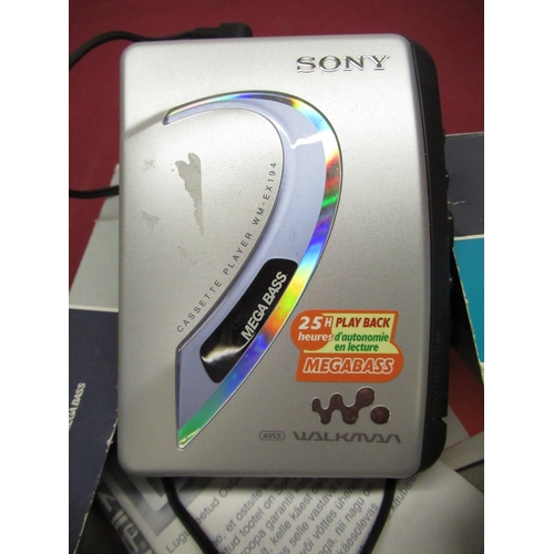 165 - Vintage Sony Walkman complete with original box, Sony CM-H4444 mobile phone and charger, Southwester... 