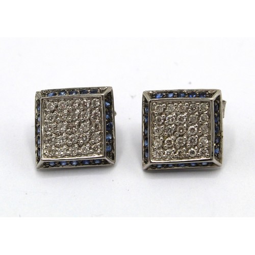 251 - Pair of 14ct white gold pave set sapphire and diamond earrings with butterfly backs, stamped 14k 585... 