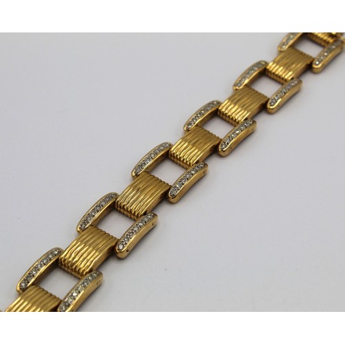 252 - Cartier style yellow metal and diamond square link bracelet, set with one hundred and forty brillian... 