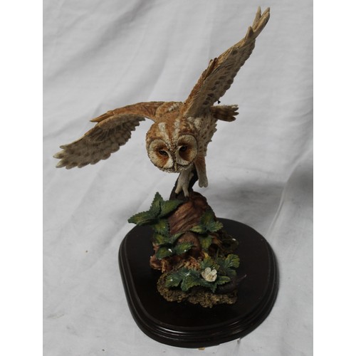 259 - Country Artists model 'Tawny Owl Landing' on shaped base, H28cm