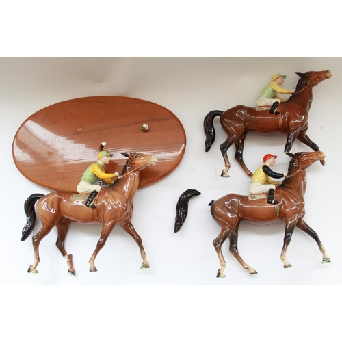 751 - Three Beswick walking racehorses and jockeys, in colourway no.2 on saddlecloth figures, two with mat... 