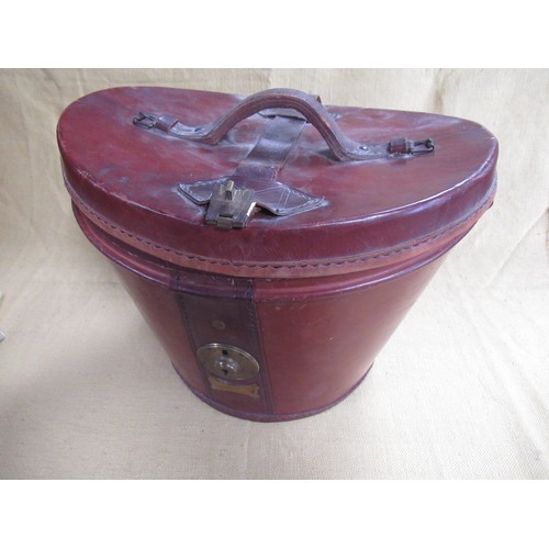 310 - G.A Dunn & Co. grey top hat, size 7 3/4 in brown leather fitted travel case, two pairs of leather gl... 