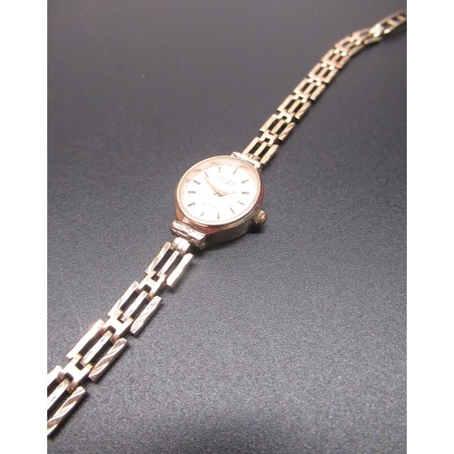 67 - Ladies rotary 9ct gold quartz cocktail watch, signed white dial with applied gold coloured stick hou... 