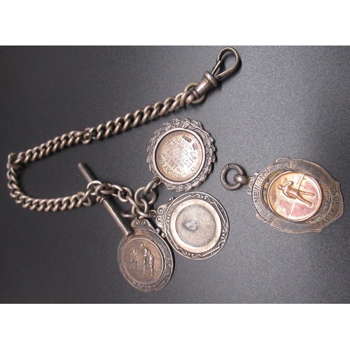 88 - Geo.V silver curb link single watch albert, Birmingham 1915 and four silver Sporting fobs, Birmingha... 