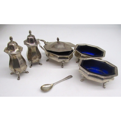 52 - Geo.V hallmarked silver five piece cruet set, including mustard pot and salts with blue glass liners... 
