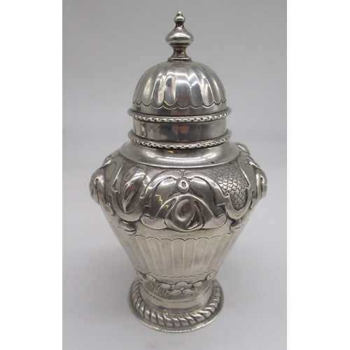 53 - Continental silver tea caddy with English import marks for London, 1889, the urn shaped body with fl... 