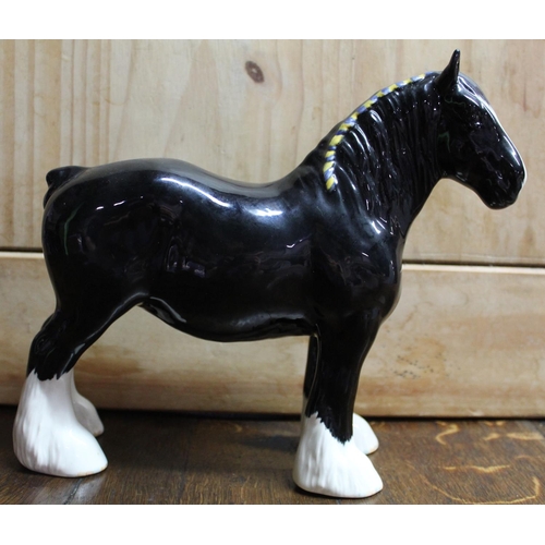 657 - Beswick model of Shire mare in black gloss finish with blue and yellow ribbon, model no. 818