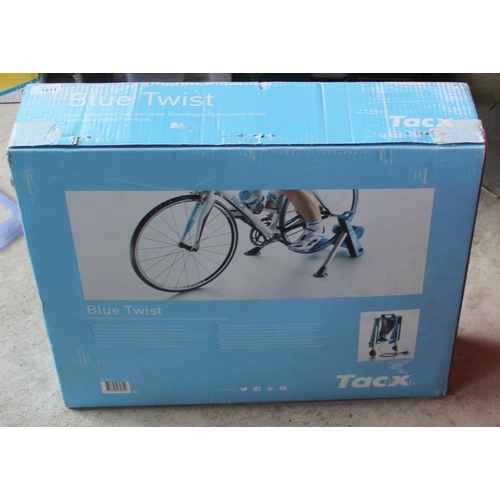 1211 - Boxed as new Blue Twist basic trainer with magnetic break