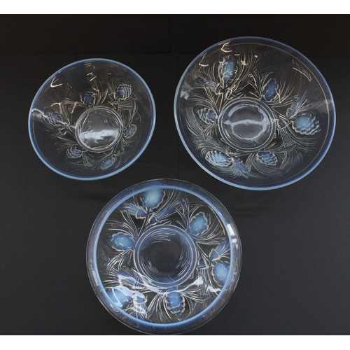 848 - Three c.1930's Jobling opalescent glass bowls in fir cone design, max W27cm (3)