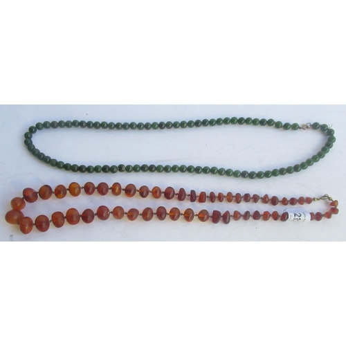 232 - Syd Little Collection - Early C20th graduating amber bead necklace with hand knotted string and a gr... 