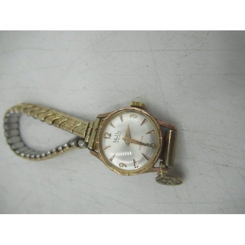 69 - Ladies Mudu Ferrotex hand wound wristwatch, signed silvered Arabic dial with gold coloured baton hou... 