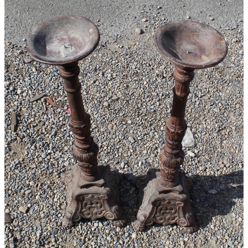 1231 - Pair of cast ornate tea light holders